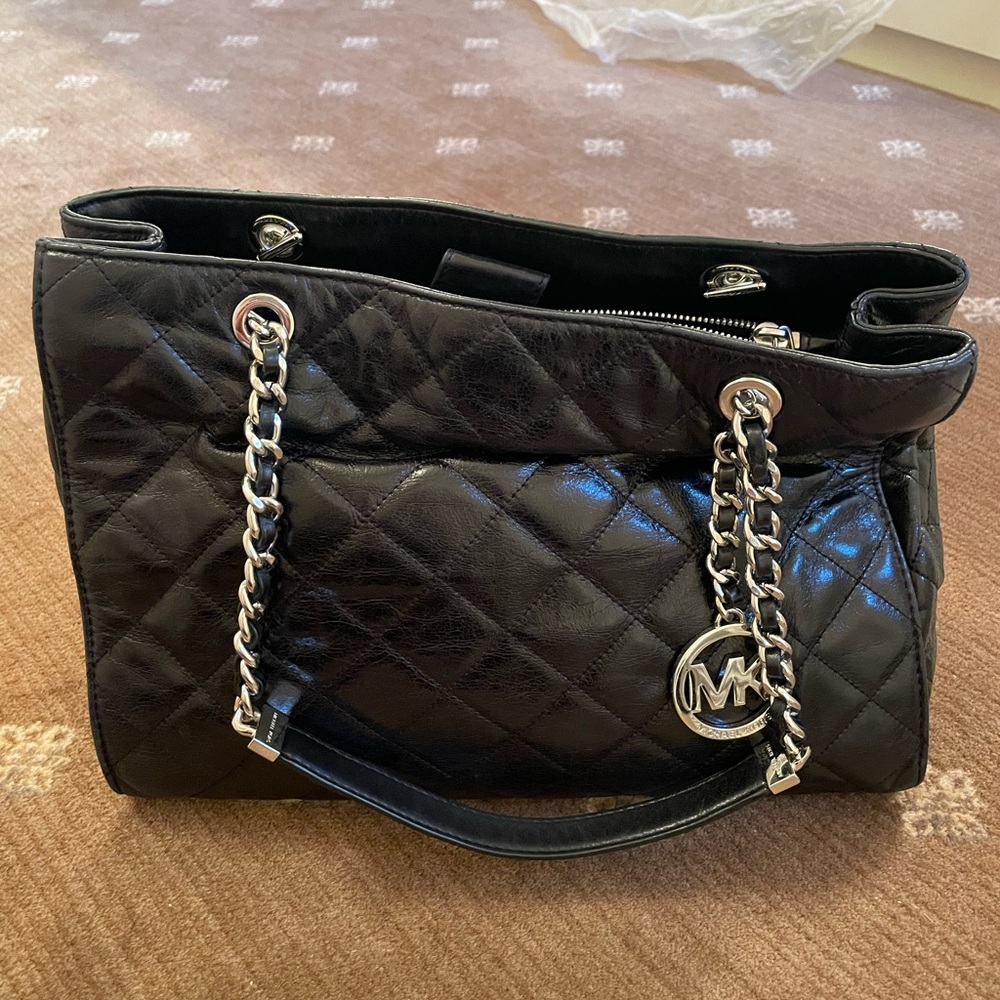 Michael Kors black leather handbag